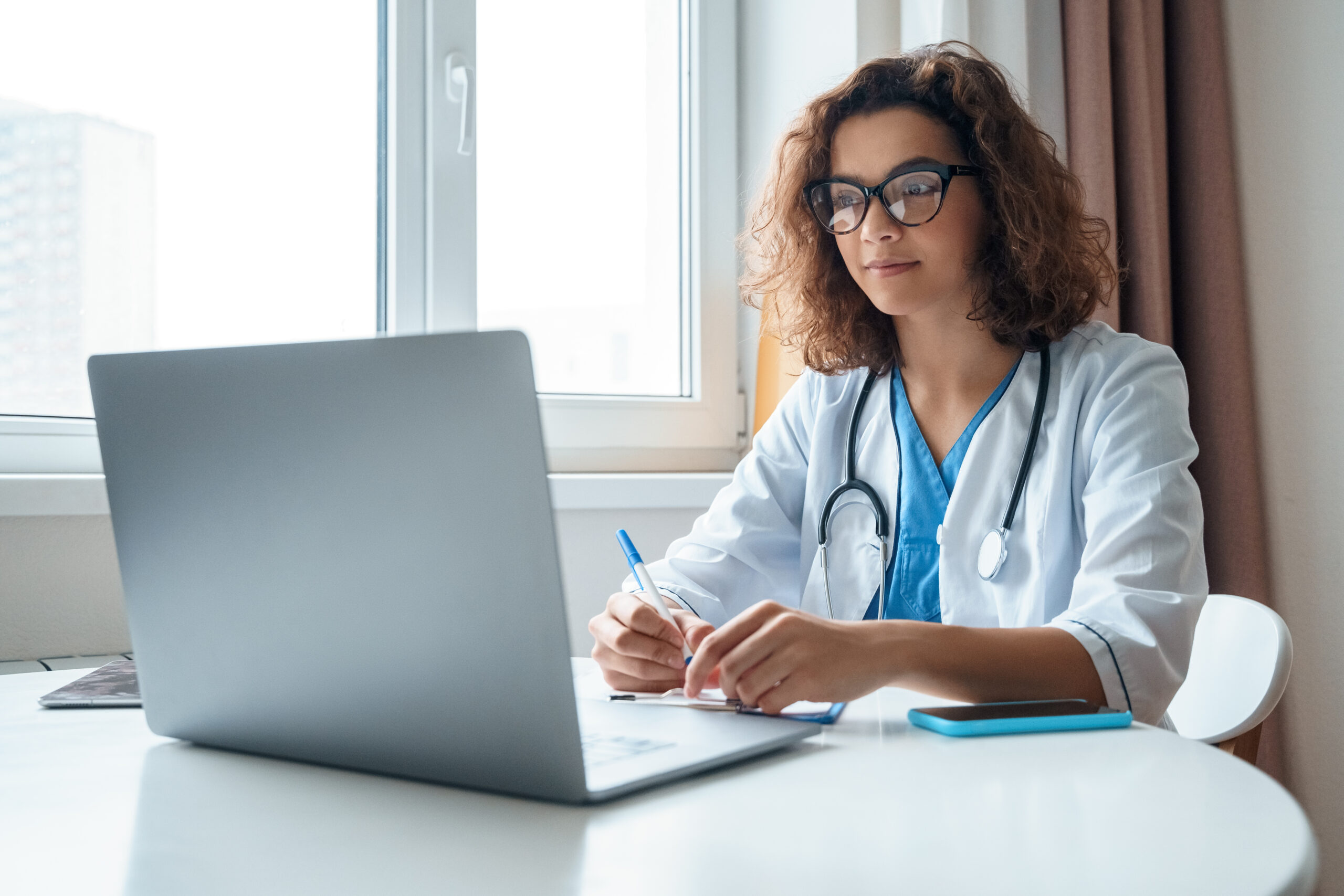 Attractive,Female,Doctor,Make,Online,Video,Call,Consult,Patient,On
